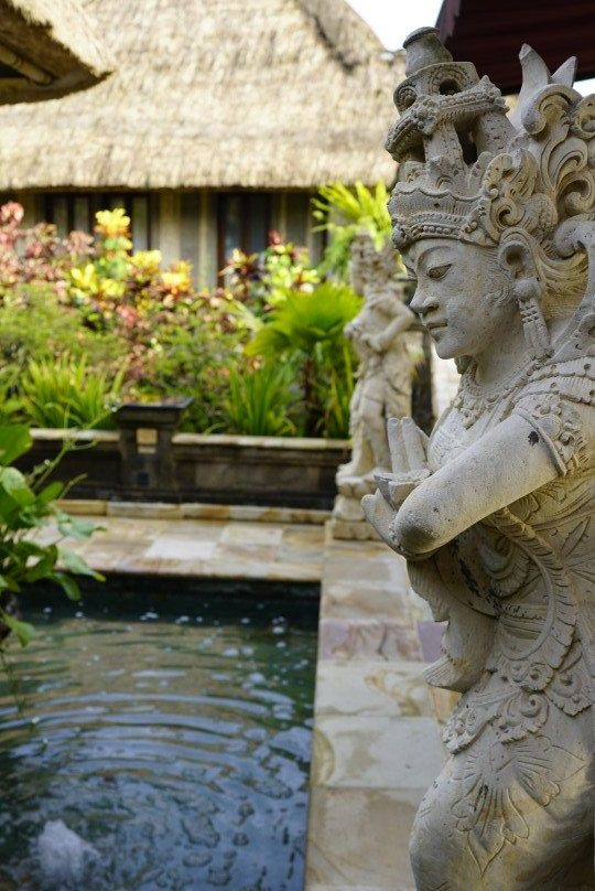 Spa area at The Viceroy Bali with Hindu statue 